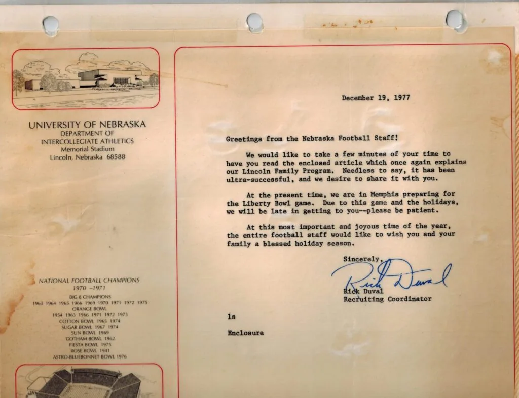 Dated letter from University of Nebraska Department of Intercollegiate Athletics dated December 19, 1977, signed by recruiting coordinator with letterhead showing football stadium and championship history.